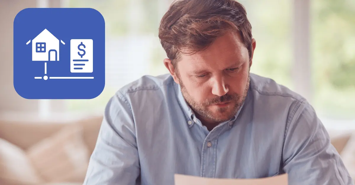 Homeowner reviewing HELOC loan documents at kitchen table.