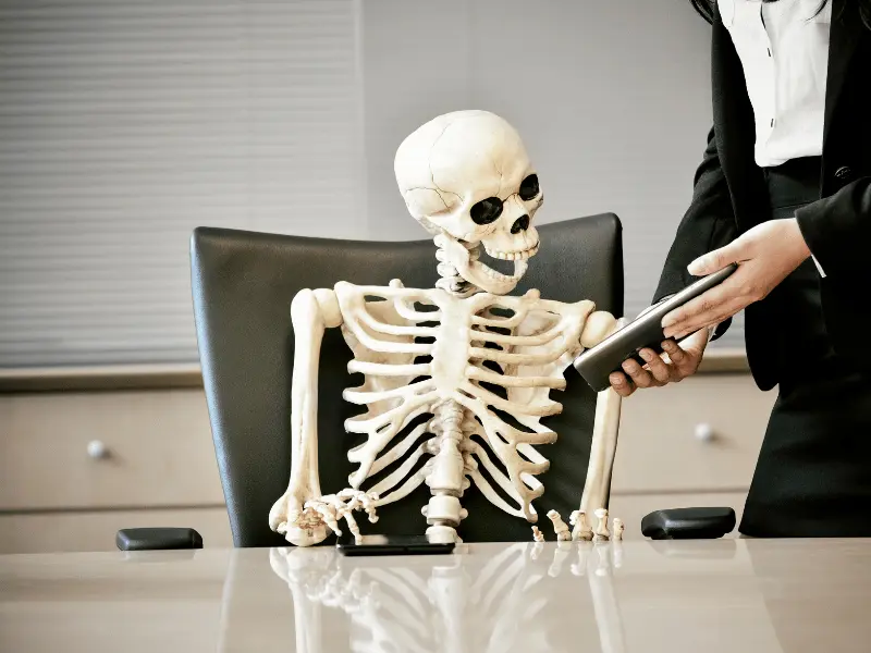 Banker discussing HELOC loan options with a skeptical homeowner reviewing paperwork.